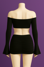 Conjunto dos piezas negro top hombros minifalda